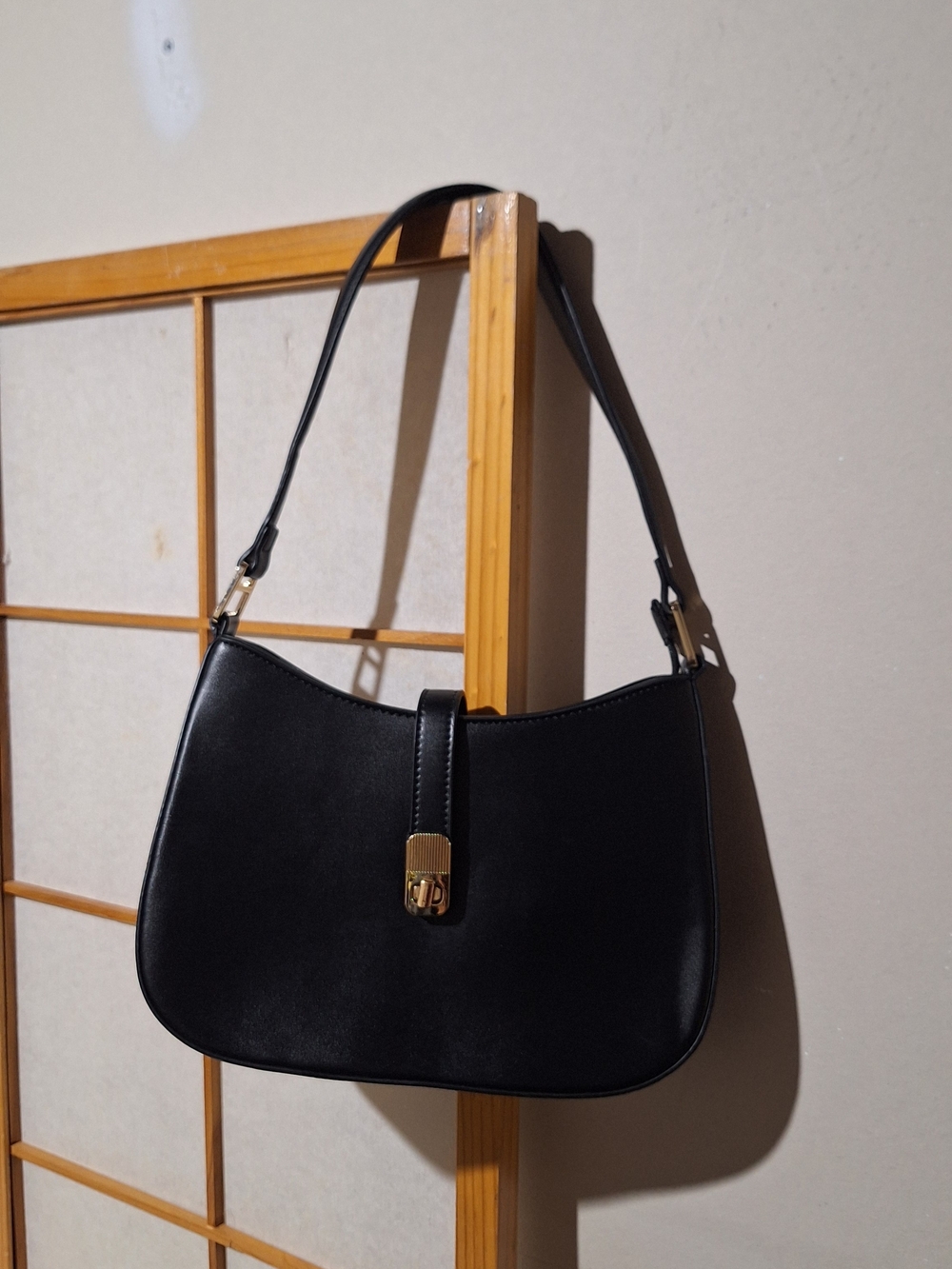 Classic Black Shoulder Bag with Gold Hardware